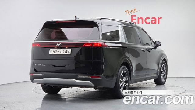 Kia Canival 2021 — photo 2