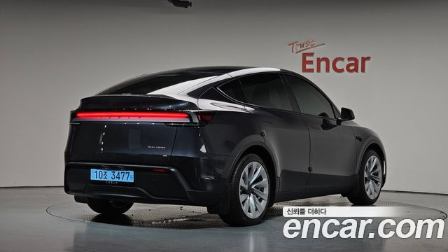 Tesla Model Y 2025 — photo 2