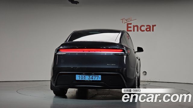 Tesla Model Y 2025 — photo 4