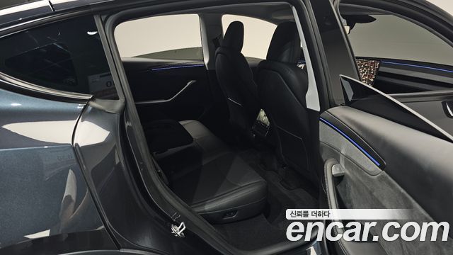 Tesla Model Y 2025 — photo 18