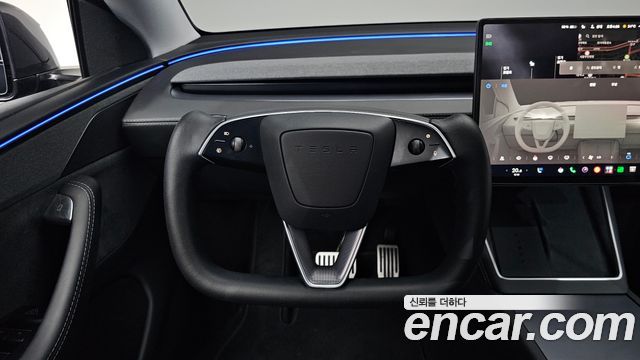 Tesla Model Y 2025 — photo 19
