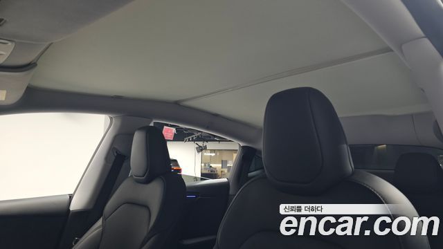 Tesla Model Y 2025 — photo 25