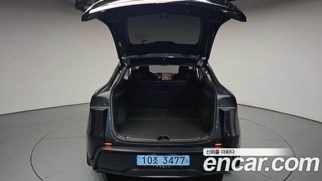 Tesla Model Y 2025 — photo 26