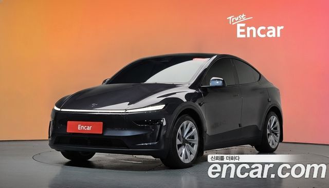 Tesla Model Y 2025 — photo 1