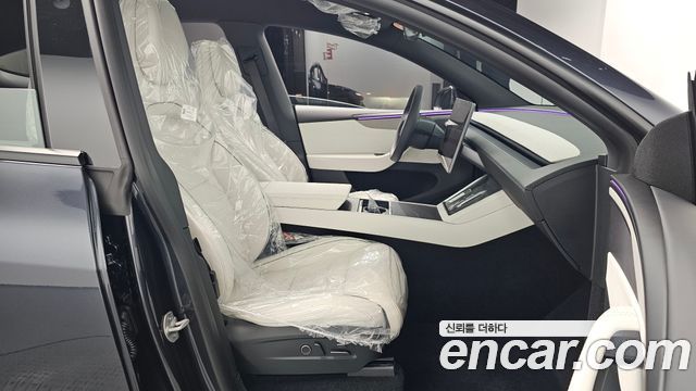 Tesla Model Y 2026 — photo 16