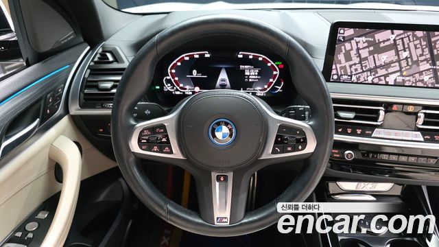 BMW iX3 2023 — photo 19