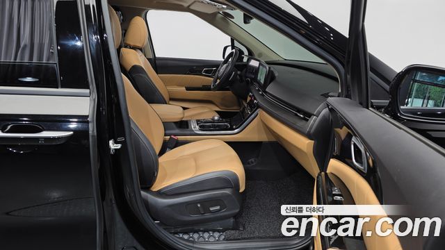 Kia Canival 2023 — photo 11