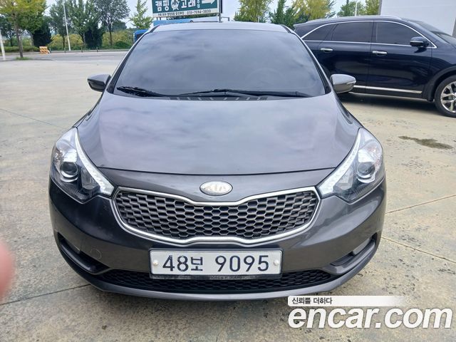 Kia K3 2013 — photo 1