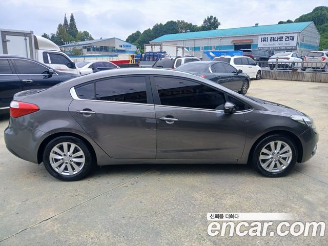 Kia K3 2013 — photo 5