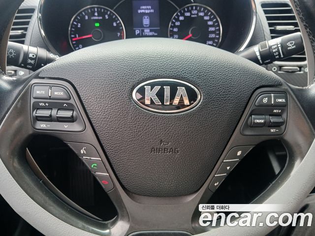 Kia K3 2013 — photo 15