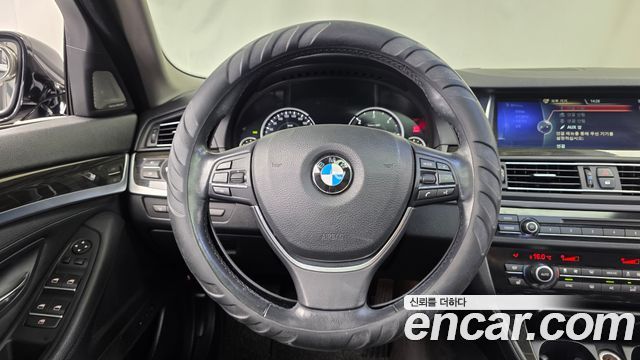 BMW 5-Series 2014 — photo 13