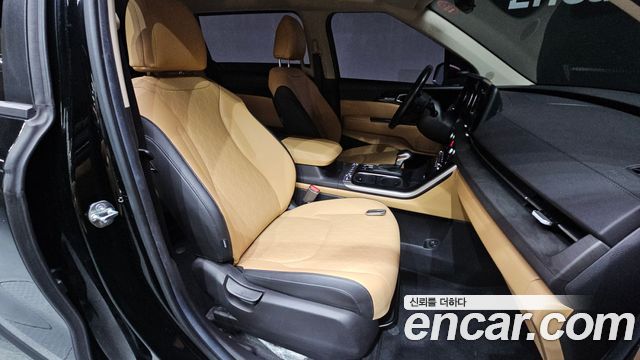 Kia Canival 2023 — photo 11