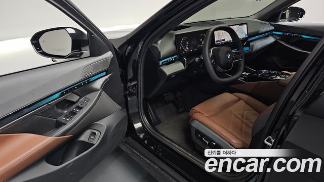 BMW 5-Series 2024 — photo 11