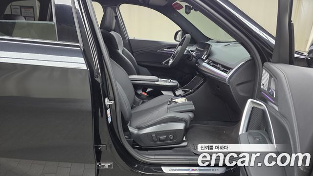 BMW iX1 2023 — photo 16
