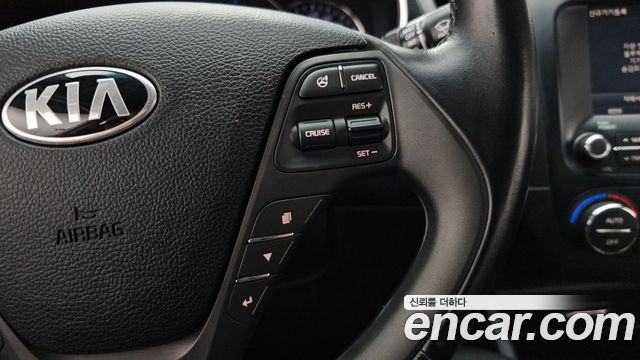 Kia K3 2015 — photo 26