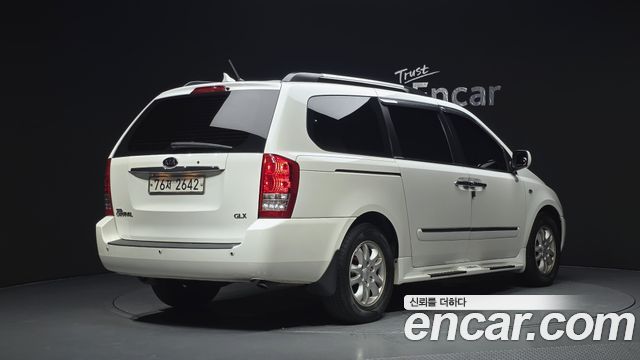 Kia Canival 2009 — photo 2