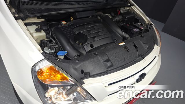 Kia Canival 2009 — photo 6