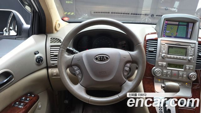 Kia Canival 2009 — photo 13