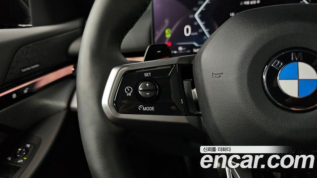 BMW 5-Series 2024 — photo 28