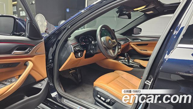 BMW 5-Series 2023 — photo 13