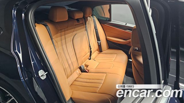 BMW 5-Series 2023 — photo 17