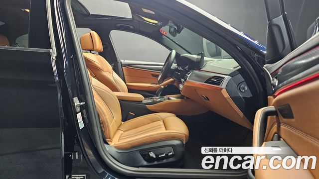 BMW 5-Series 2023 — photo 16
