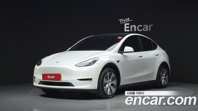 Tesla Model Y 2021 — photo 1