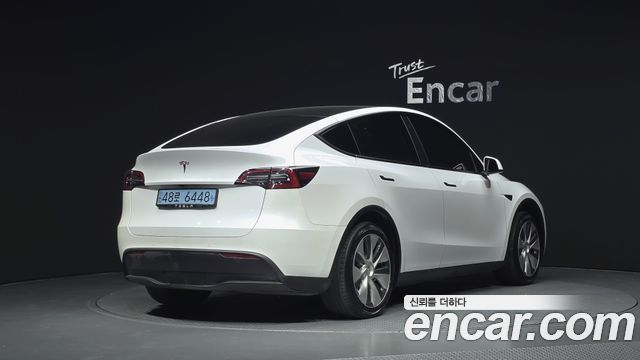 Tesla Model Y 2021 — photo 2