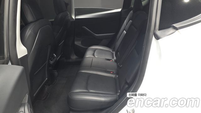 Tesla Model Y 2021 — photo 18