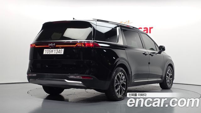 Kia Canival 2023 — photo 2