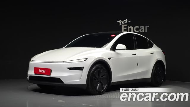 Tesla Model Y 2025 — photo 1