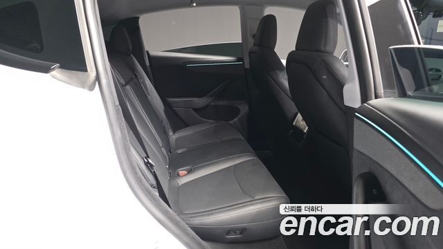 Tesla Model Y 2025 — photo 18