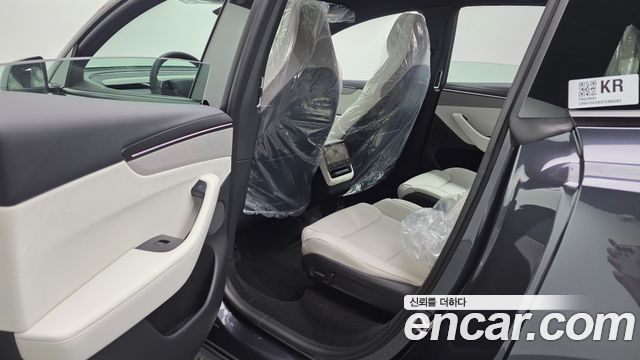 Tesla Model Y 2026 — photo 18