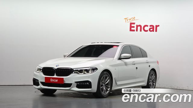 BMW 5-Series 2018 — photo 1