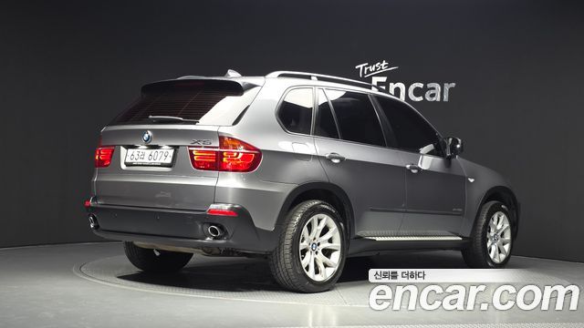 BMW X5 2010 — photo 2