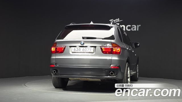 BMW X5 2010 — photo 4