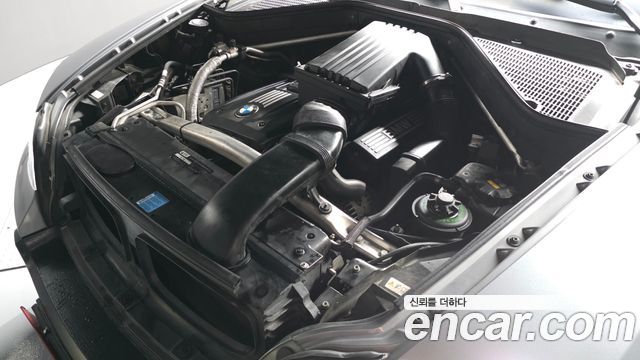 BMW X5 2010 — photo 6