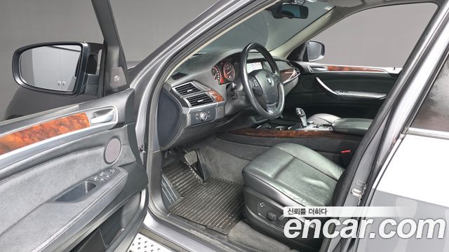 BMW X5 2010 — photo 10