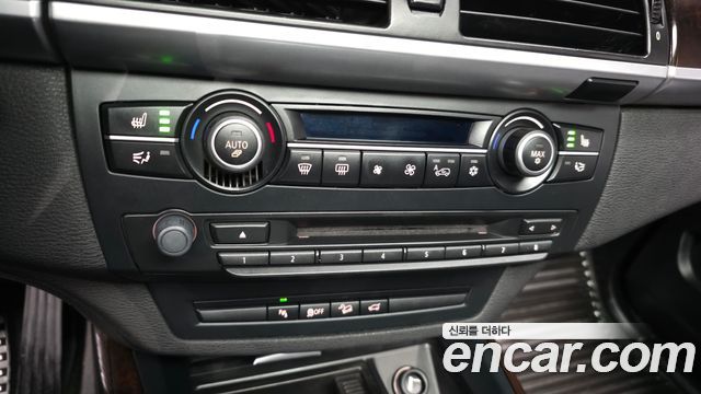 BMW X5 2010 — photo 16