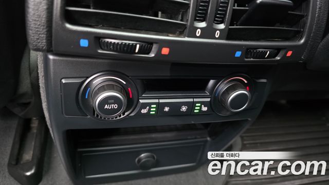 BMW X5 2010 — photo 18