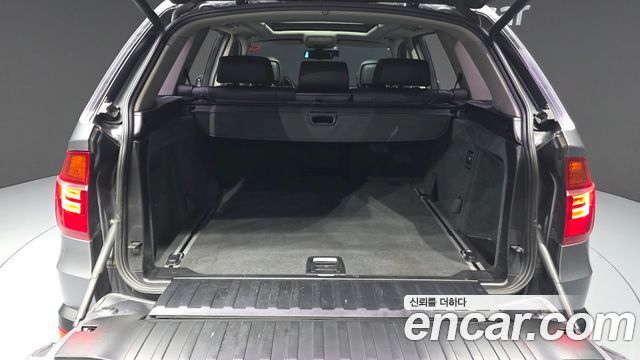 BMW X5 2010 — photo 20