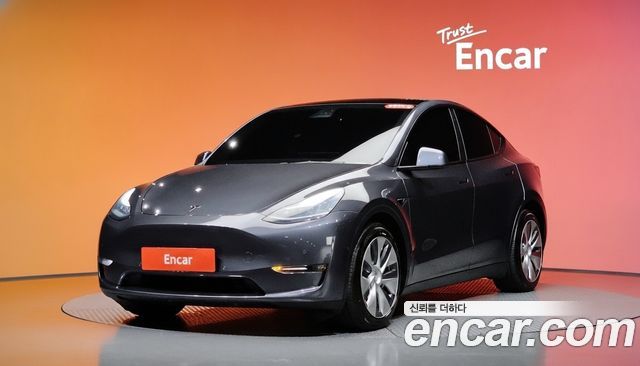 Tesla Model Y 2021 — photo 1