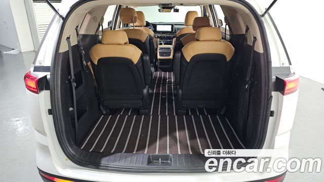 Kia Canival 2023 — photo 35