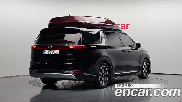 Kia Canival 2021 — photo 2