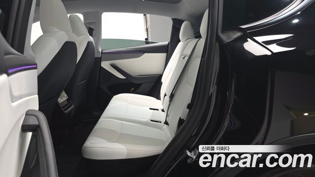 Tesla Model Y 2025 — photo 18