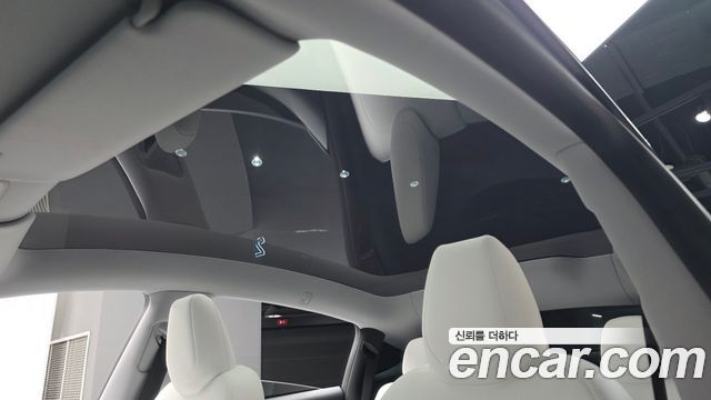 Tesla Model Y 2025 — photo 22