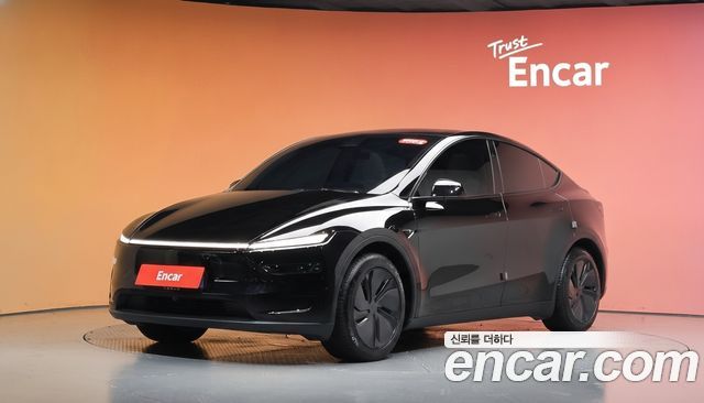 Tesla Model Y 2025 — photo 1