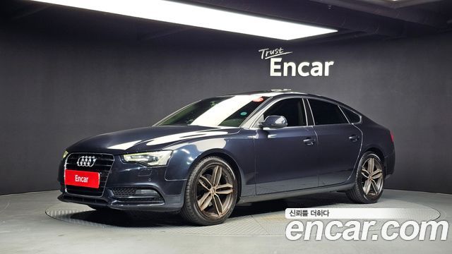Audi A5 2013 — photo 1