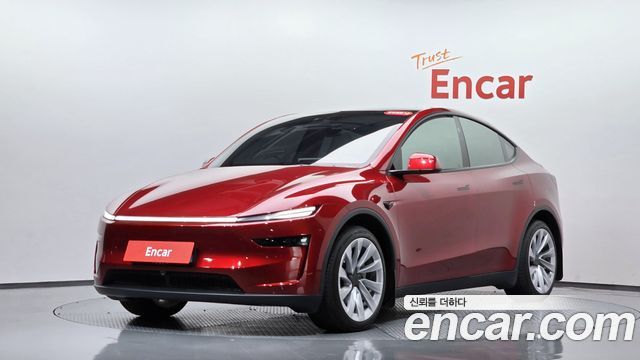 Tesla Model Y 2025 — photo 35