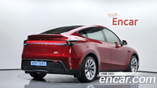 Tesla Model Y 2025 — photo 2